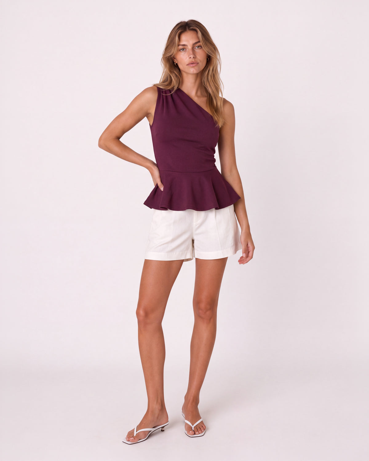 ONE-SHOULDER PEPLUM TOP