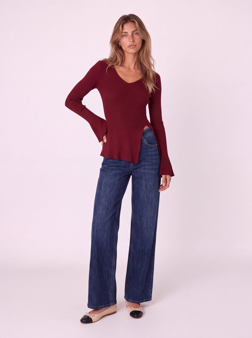V-NECK RIBBED KNIT PEPLUM TOP WITH FLARED SLEEVES