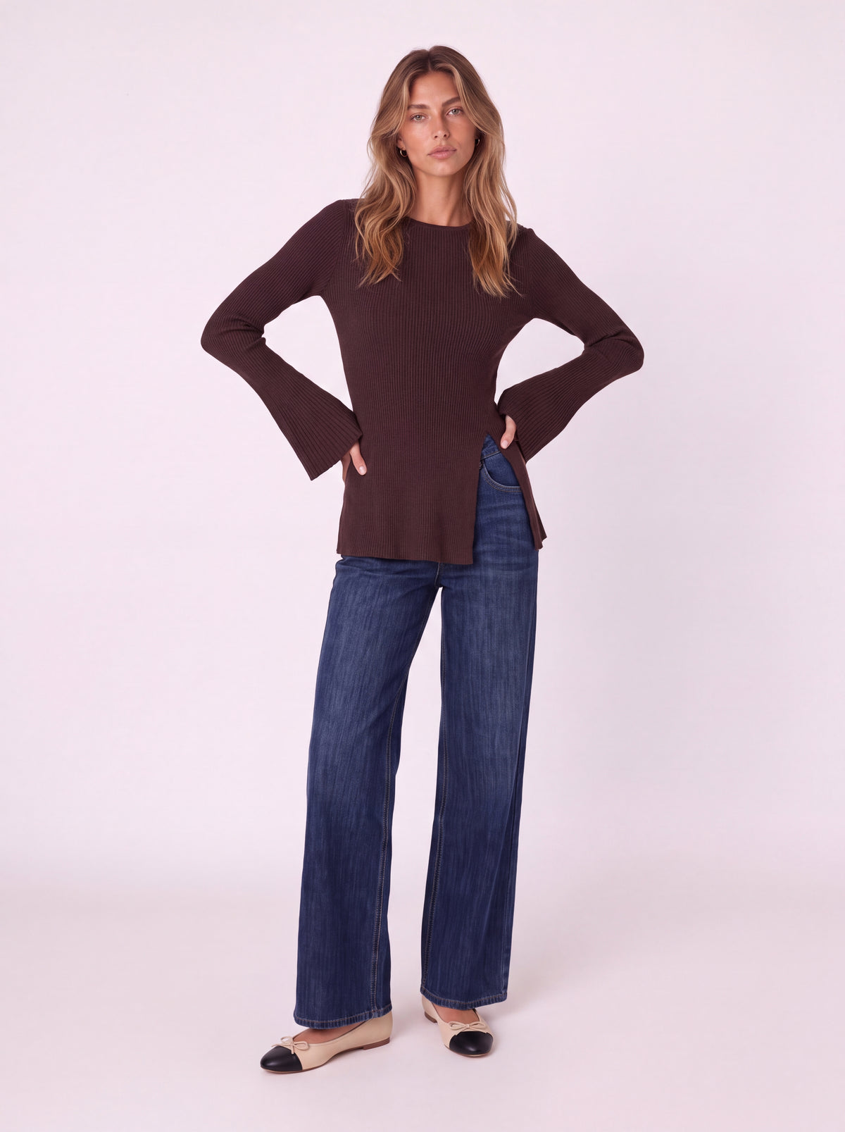 V-NECK RIBBED KNIT PEPLUM TOP WITH FLARED SLEEVES