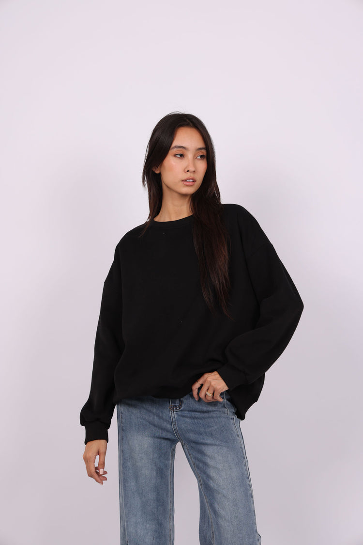NEVER LOOK BACK OVERSIZED SWEATSHIRT