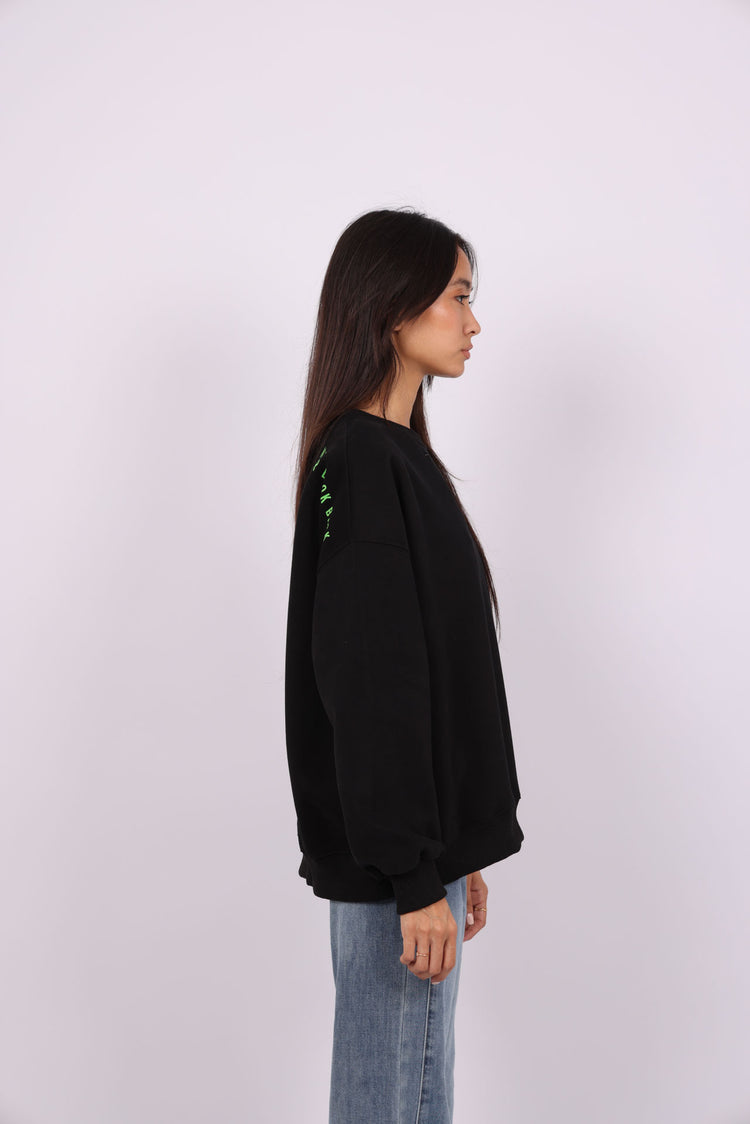 NEVER LOOK BACK OVERSIZED SWEATSHIRT