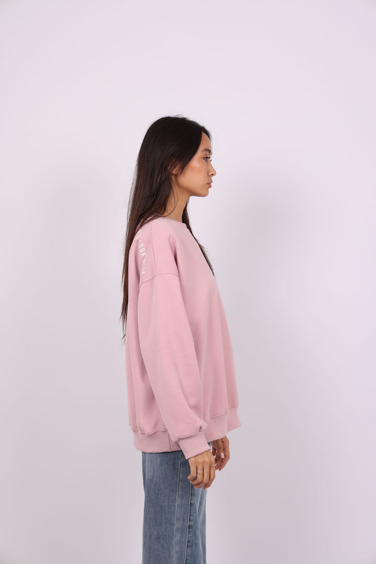 NEVER LOOK BACK OVERSIZED SWEATSHIRT