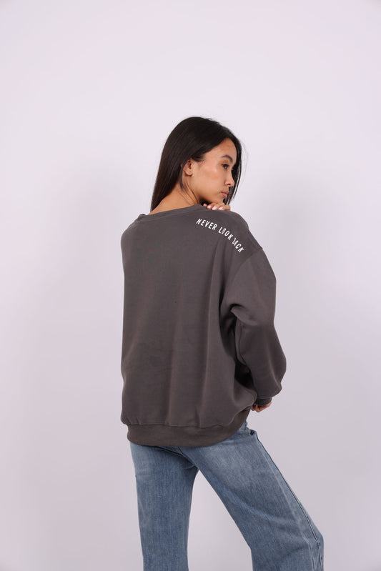 NEVER LOOK BACK OVERSIZED SWEATSHIRT