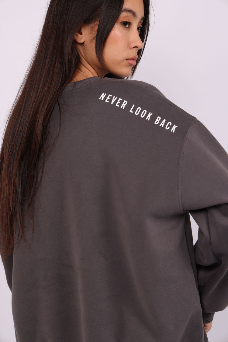 NEVER LOOK BACK OVERSIZED SWEATSHIRT