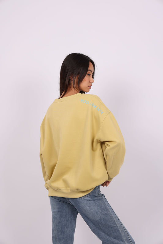 NEVER LOOK BACK OVERSIZED SWEATSHIRT