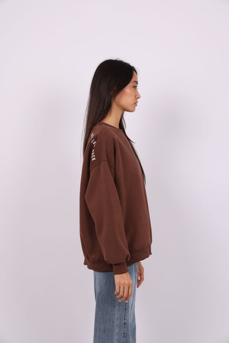 NEVER LOOK BACK OVERSIZED SWEATSHIRT