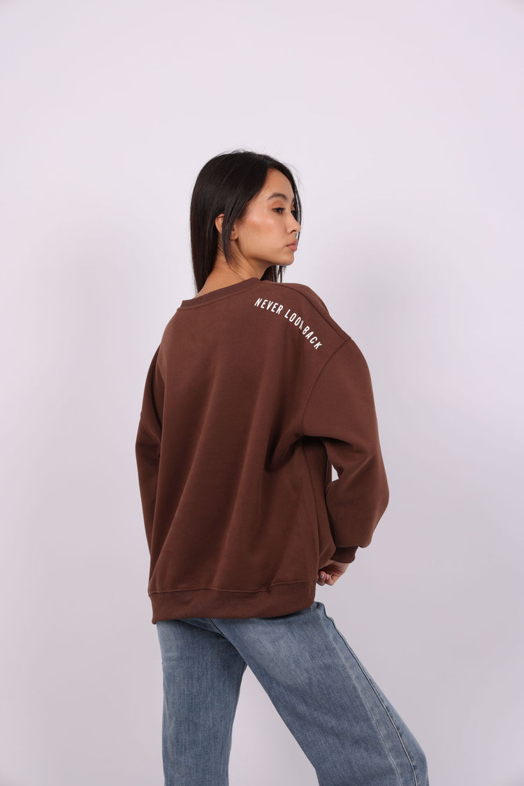 NEVER LOOK BACK OVERSIZED SWEATSHIRT