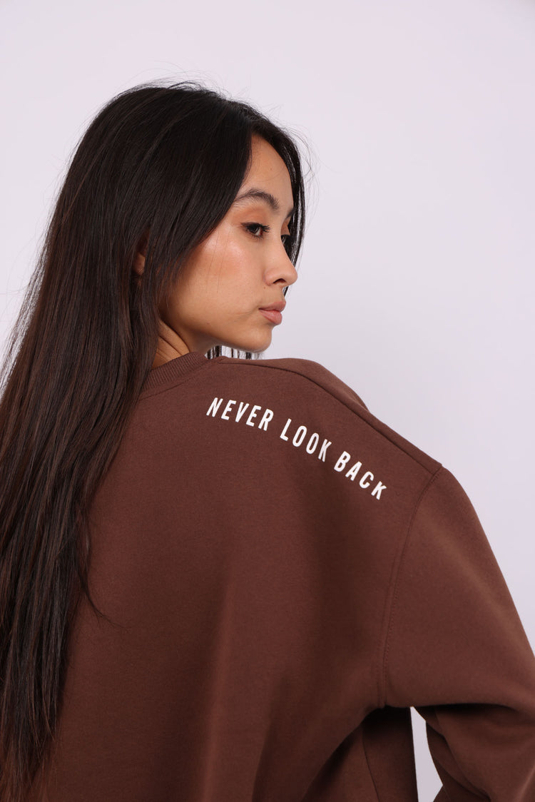 NEVER LOOK BACK OVERSIZED SWEATSHIRT