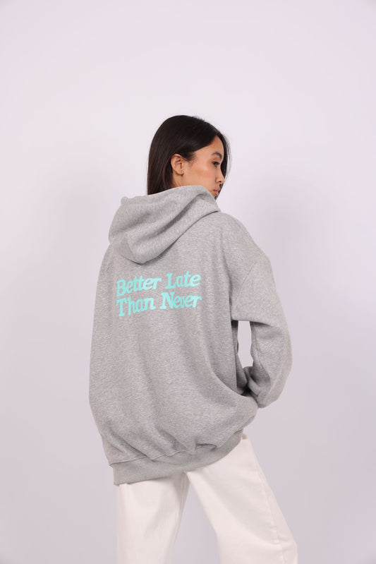 OVERSIZED HOODIE WITH BACK PRINT – "BETTER LATE THAN NEVER"