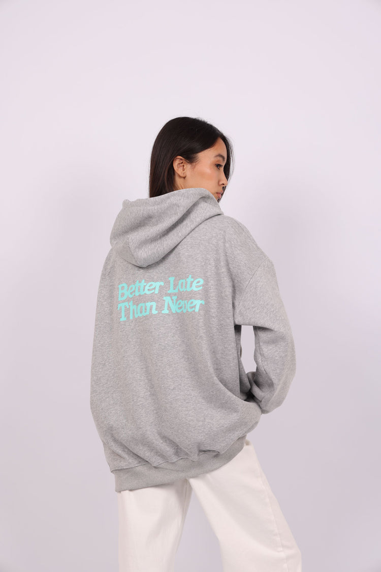 OVERSIZED HOODIE WITH BACK PRINT – "BETTER LATE THAN NEVER"